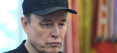 Elon Musk attends a news conference with President Donald Trump in the Oval Office of the White House, Friday, May 30, 2025, in Washington. (AP Photo/Evan Vucci)