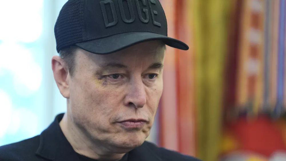 Elon Musk attends a news conference with President Donald Trump in the Oval Office of the White House, Friday, May 30, 2025, in Washington. (AP Photo/Evan Vucci)