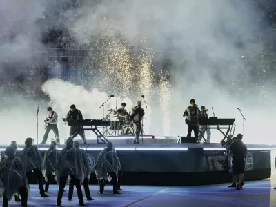 Linkin Park performs before the Champions League final soccer match between Paris Saint-Germain and Inter Milan at the Allianz Arena in Munich, Germany, Saturday, May 31, 2025. (AP Photo/Martin Meissner)