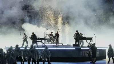 Linkin Park performs before the Champions League final soccer match between Paris Saint-Germain and Inter Milan at the Allianz Arena in Munich, Germany, Saturday, May 31, 2025. (AP Photo/Martin Meissner)