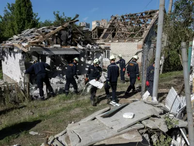 Emergency workers remove debris from a private house that was damaged in a Russian drone strike, amid Russia's attack on Ukraine, in Zaporizhzhia, Ukraine, June 1, 2025. REUTERS/Thomas Peter