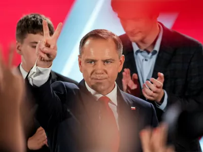 Polish presidential candidate Karol Nawrocki, backed by the main opposition Law and Justice (PiS) party, reacts to the exit polls of the second round of the presidential election, in Warsaw, Poland, June 1, 2025. REUTERS/Aleksandra Szmigiel
