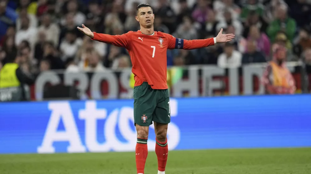 Portugal's Cristiano Ronaldo gestures during the Nations League semifinal soccer match between Portugal and Germany at the Munich Football Arena, in Munich, Germany, Wednesday, June 4, 2025. (AP Photo/Martin Meissner)