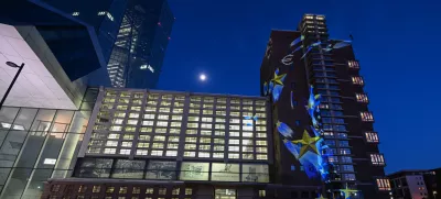 FILED - 08 May 2025, Hesse, Frankfurt/Main: Images of stars and euro signs are projected onto part of the former Frankfurt Grossmarkthalle at the European Central Bank (ECB). Photo: Arne Dedert/dpa