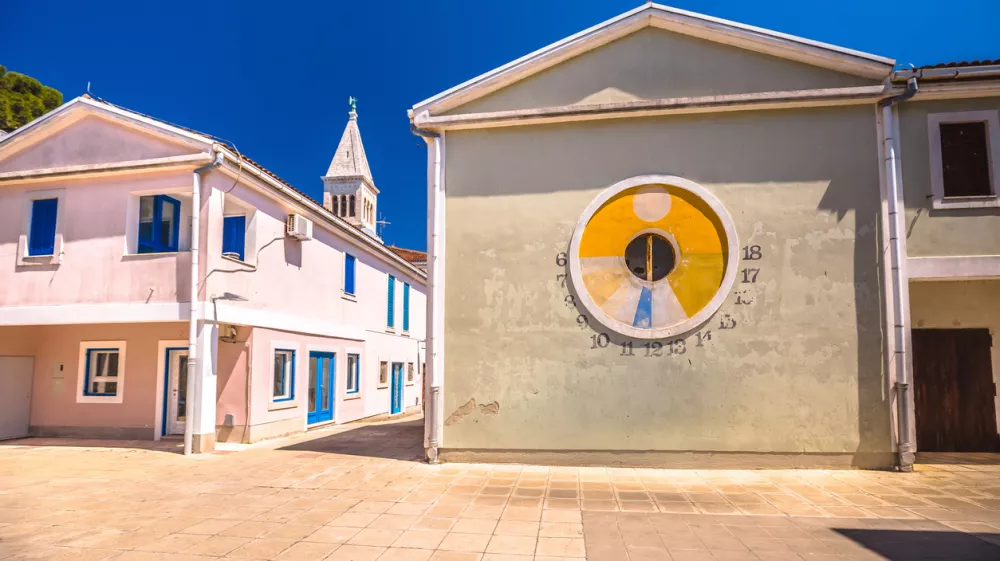Novigrad Istarski colorful square architecture view, solar clock, Istria region of Croatia