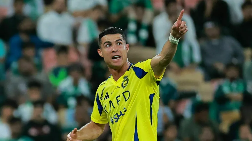 Soccer Football - Saudi Pro League - Al Ahli v Al Nassr - King Abdullah Sports City, Jeddah, Saudi Arabia - February 13, 2025 Al Nassr's Cristiano Ronaldo reacts after being substituted REUTERS/Stringer