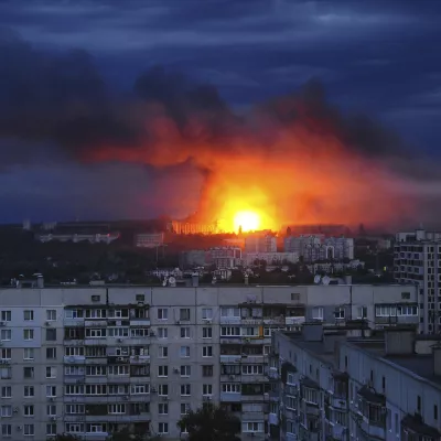 Fire and smoke rise from the site where a Russian missile struck a residential area in Kharkiv, Ukraine, Saturday, June 7, 2025, (AP Photo/Anatolii Lysianskyi)