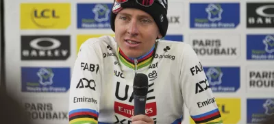 Tadej Pogacar, of Slovenia, speaks with the media after finishing second in the Paris-Roubaix cycling race in Roubaix, France, Sunday, April 13, 2025. (AP Photo/Thibault Camus)