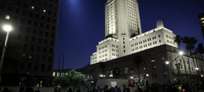 Demonstrators march outside the Los Angeles City Hall, as protests against federal immigration sweeps continue, in downtown Los Angeles, California, U.S. June 10, 2025. REUTERS/Leah Millis