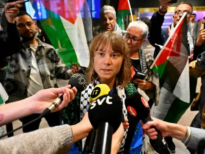 Swedish activist Greta Thunberg talks to journalists as she arrives at Arlanda airport outside Stockholm, Sweden, June 10, 2025. TT News Agency/Anders Wiklund via REUTERS   ATTENTION EDITORS - THIS IMAGE WAS PROVIDED BY A THIRD PARTY. SWEDEN OUT. NO COMMERCIAL OR EDITORIAL SALES IN SWEDEN.