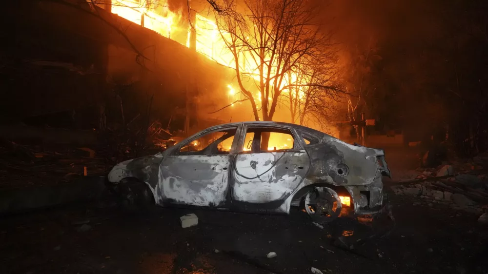 Firefighters tackle a blaze after a Russian attack that hit a residential building in Kharkiv, Ukraine, Wednesday, June 11, 2025. (AP Photo/Andrii Marienko)