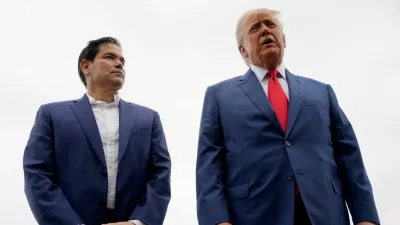 FILE PHOTO: U.S. President Donald Trump stands with U.S. Secretary of State Marco Rubio as he prepares to depart for Hagerstown, Maryland, at Morristown Municipal Airport in Morristown, New Jersey, U.S., June 8, 2025. REUTERS/Nathan Howard/File Photo