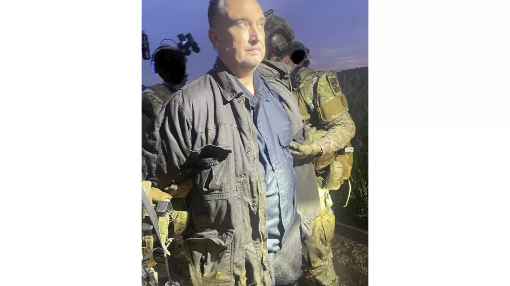 This photo made available by the Ramsey County Sheriff's Office shows Vance Luther Boelter, the man accused of assassinating the top Democrat in the Minnesota House, as he was arrested late Sunday, June 15, 2025. (Ramsey County Sheriff's Office via AP)