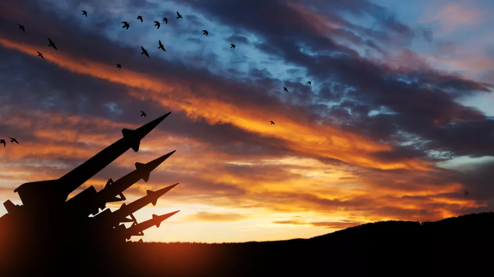 The missiles are aimed at the sky at sunset. Nuclear bomb, chemical weapons, missile defense, a system of salvo fire.