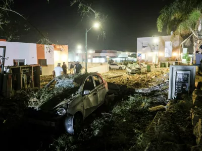 Security and rescue personnel work at an impact site following missile attack from Iran on Israel, at Zavdiel, Israel, June 15, 2025. REUTERS/Itay Cohen