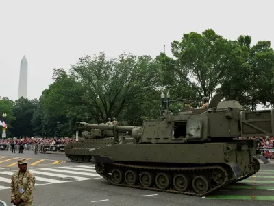 A Paladin self-propelled howitzer passes during a military parade to commemorate the U.S. Army's 250th Birthday in Washington, D.C., U.S., June 14, 2025. REUTERS/Kevin Mohatt REFILE - CORRECTING NAME OF THE MILITARY VEHICLE FROM "M1A2/ABRAMS TANK" TO "PALADIN SELF-PROPELLED HOWITZER".