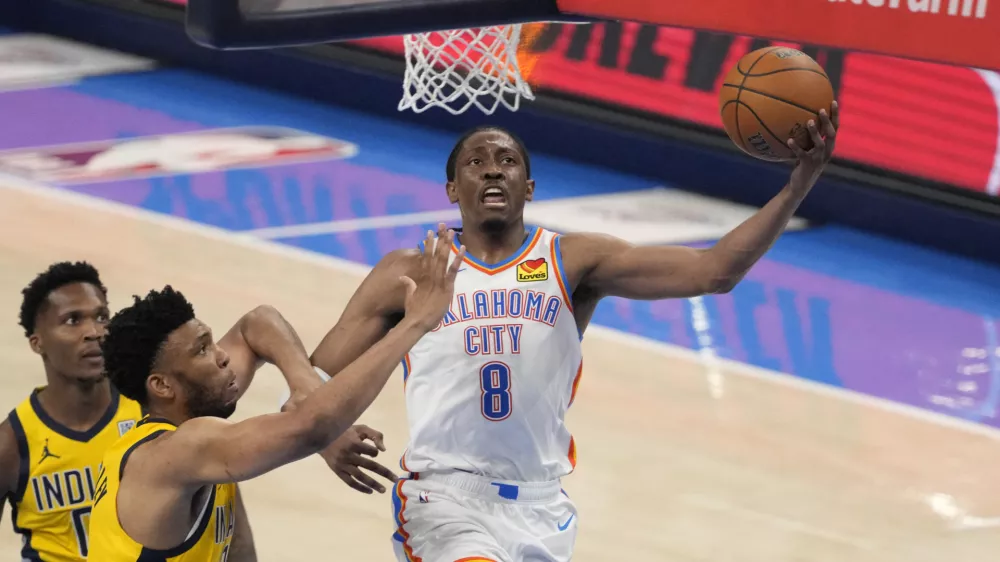 Jun 16, 2025; Oklahoma City, Oklahoma, USA; Oklahoma City Thunder forward Jalen Williams (8) shoots against Indiana Pacers center Tony Bradley (13) during the third quarter of game five of the 2025 NBA Finals at Paycom Center. Mandatory Credit: Kyle Terada-Imagn Images