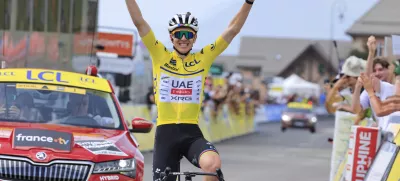 14 June 2025, France, Mont-Cenis: Slovenian cyclist Tadej Pogacar of UAE Team Emirates XRG celebrates winning the 8th and final stage of the 77th edition of the Criterium du Dauphine cycling race, 133.3 km from Val-d'Arc-Val-Cenis to Plateau du Mont Cenis. Photo: Stefano Cavasino/LiveMedia-IPA/ZUMA Press Wire/dpa