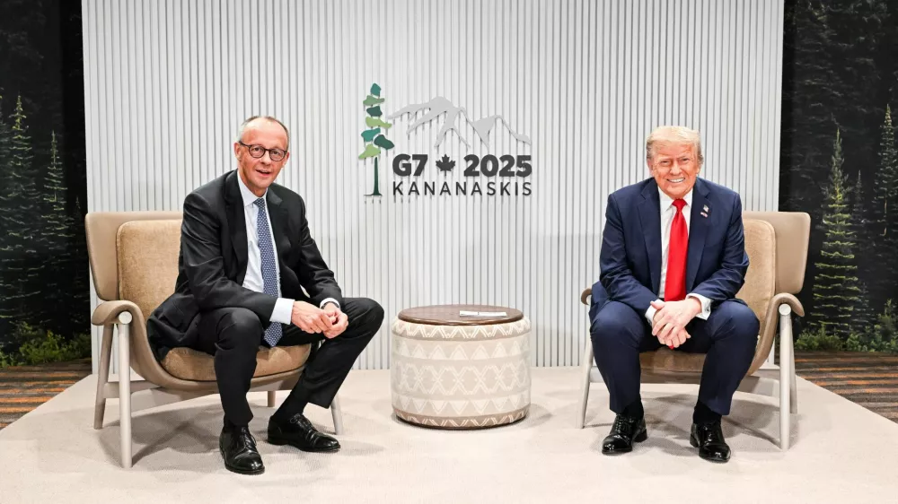 German Chancellor Friedrich Merz and U.S. President Donald Trump meet for their bilateral talks during the G7 Summit, in Kananaskis, Alberta, Canada, June 16, 2025. Guido Bergmann/Bundesregierung/Handout via REUTERS ATTENTION EDITORS - THIS IMAGE HAS BEEN SUPPLIED BY A THIRD PARTY. NO RESALES. NO ARCHIVES