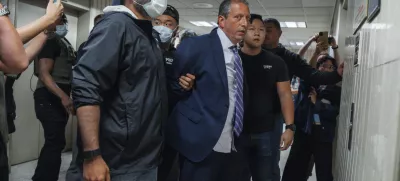 New York City Comptroller Brad Lander is placed under arrest by Immigration and Customs Enforcement (ICE) and FBI agents outside federal immigration court on Tuesday, June 17, 2025, in New York. (AP Photo/Olga Fedorova)