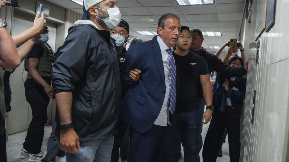 New York City Comptroller Brad Lander is placed under arrest by Immigration and Customs Enforcement (ICE) and FBI agents outside federal immigration court on Tuesday, June 17, 2025, in New York. (AP Photo/Olga Fedorova)
