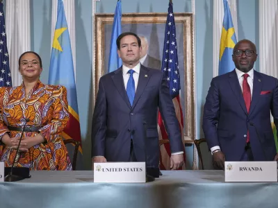 FILE - Secretary of State Marco Rubio hosts a signing ceremony in which Congo's Foreign Minister Therese Kayikwamba Wagner, left, and Rwanda's Foreign Minister Olivier Nduhungirehe, right, pledge to work toward a peace deal at the State Department in Washington, April 25, 2025. (AP Photo/Jacquelyn Martin, File)
