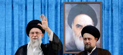 FILE PHOTO: Ayatollah Ruhollah Khomeini's grandson, Hassan Khomeini stands next to Iran's Supreme Leader Ayatollah Ali Khamenei during the 36th anniversary of the death of the leader of Iran's 1979 Islamic Revolution, Ayatollah Ruhollah Khomeini, at Khomeini's shrine in southern Tehran, Iran June 4, 2025. Office of the Iranian Supreme Leader/WANA (West Asia News Agency)/Handout via REUTERS ATTENTION EDITORS - THIS PICTURE WAS PROVIDED BY A THIRD PARTY/File photo