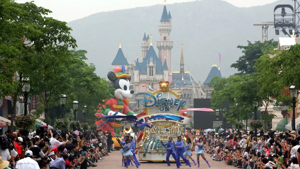 Floats and a huge Mickey Mouse is on parade at Hong Kong Disneyland Saturday, Sept. 11, 2005, one day before its official opening. It is Disney's first-ever vacation resort in China. (AP Photo/Vincent Yu)