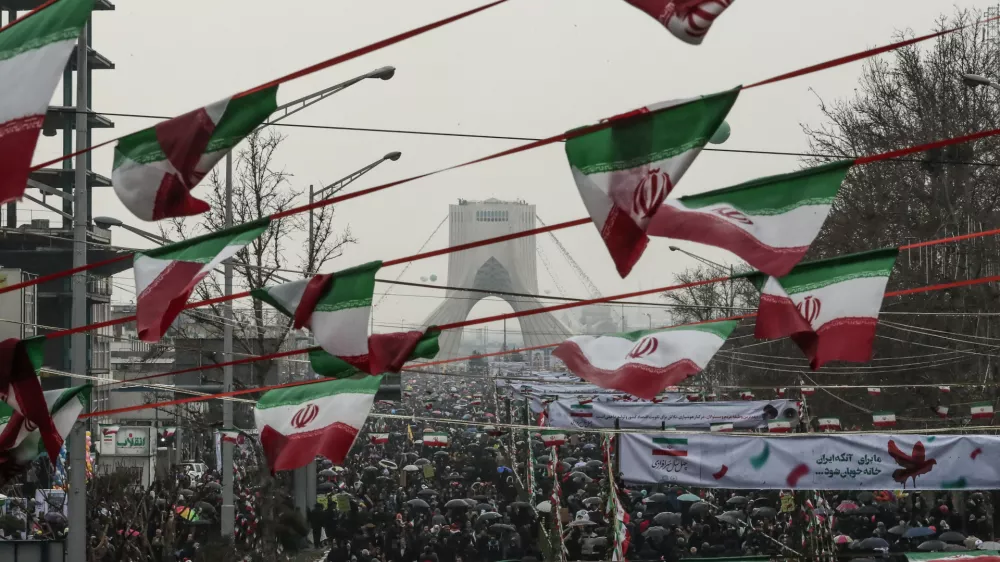 11 February 2019, Iran, Tehran: People gather in front of the Azadi Tower at the Azadi Square during a ceremony marking the 40th anniversary of the Iranian Islamic Revolution. Photo: Saeid Zareian/dpa
