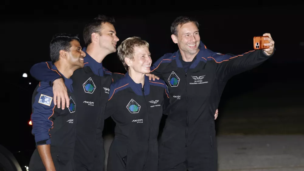 SpaceX Falcon 9 crew pose for a selfie before departing for a launch to the International Space Station at the Kennedy Space Center in Cape Canaveral, Fla., Tuesday, June 24, 2025. (AP Photo/Terry Renna)