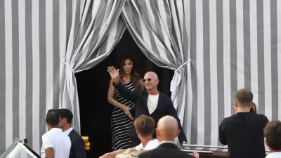 Amazon multi-billionaire founder Jeff Bezos, right, and Lauren Sanchez leave a hotel in Venice, Italy, on Wednesday, June 25, 2025, ahead of festivities in the lagoon city reportedly linked to their wedding. (AP Photo/Luigi Costantini)