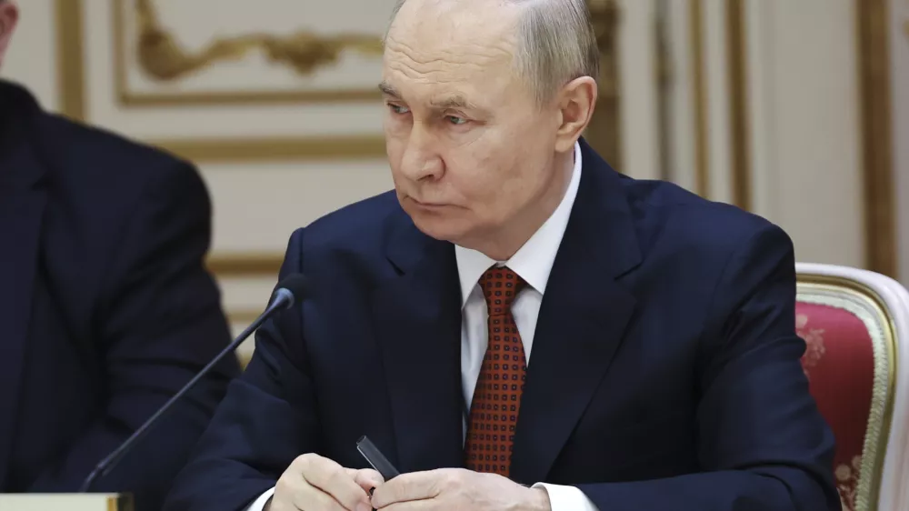 Russian President Vladimir Putin attends a meeting of the Supreme Eurasian Economic Council on the sidelines of the Eurasian Economic Forum in Minsk, Belarus, Friday, June 27, 2025. (Alexander Kazakov, Sputnik, Kremlin Pool Photo via AP)