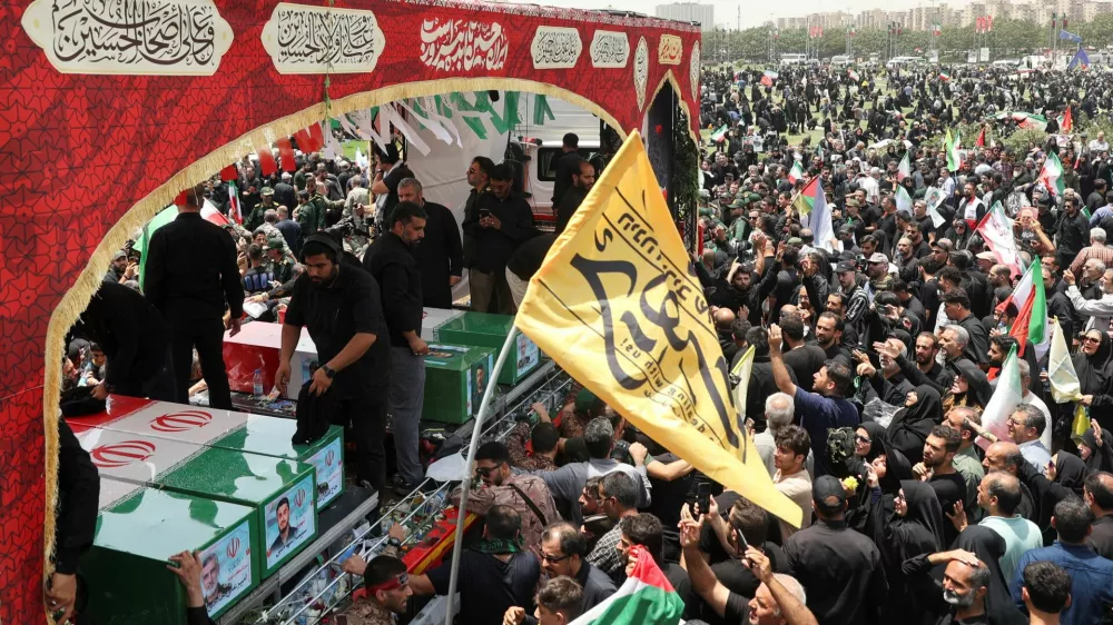 People attend the funeral procession of Iranian military commanders, nuclear scientists and others killed in Israeli strikes, in Tehran, Iran, June 28, 2025. Majid Asgaripour/WANA (West Asia News Agency) via REUTERS  ATTENTION EDITORS - THIS PICTURE WAS PROVIDED BY A THIRD PARTY
