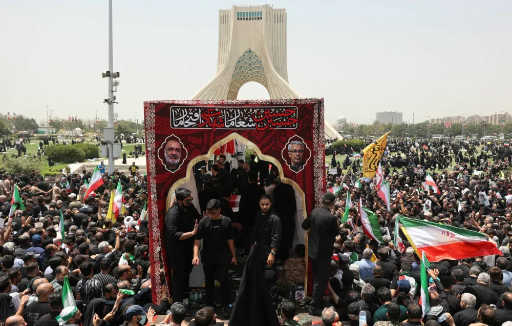 People attend the funeral procession of Iranian military commanders, nuclear scientists and others killed in Israeli strikes, in Tehran, Iran, June 28, 2025. Majid Asgaripour/WANA (West Asia News Agency) via REUTERS  ATTENTION EDITORS - THIS PICTURE WAS PROVIDED BY A THIRD PARTY
