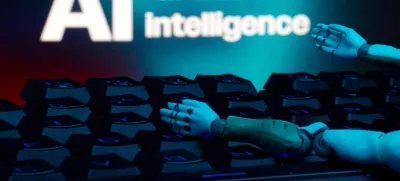 FILE PHOTO: A message reading "AI artificial intelligence", a keyboard, and robot hands are seen in this illustration taken January 27, 2025. REUTERS/Dado Ruvic/Illustration/File Photo