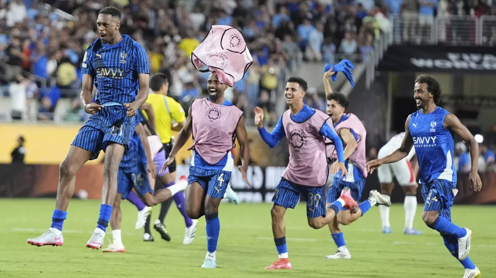 Al Hilal players celebrate following the Club World Cup round of 16 soccer match between Manchester City and Al Hilal in Orlando, Fla., Monday, June 30, 2025. (AP Photo/John Raoux)