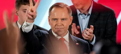 Polish presidential candidate Karol Nawrocki, backed by the main opposition Law and Justice (PiS) party, reacts to the exit polls of the second round of the presidential election, in Warsaw, Poland, June 1, 2025. REUTERS/Aleksandra Szmigiel   TPX IMAGES OF THE DAY