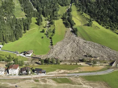 A mudslide covered homes and a street in the Gschnitztal valley in Tyrol, Austria, Tuesday, July 1, 2025. (BFV IBK-Land via AP)