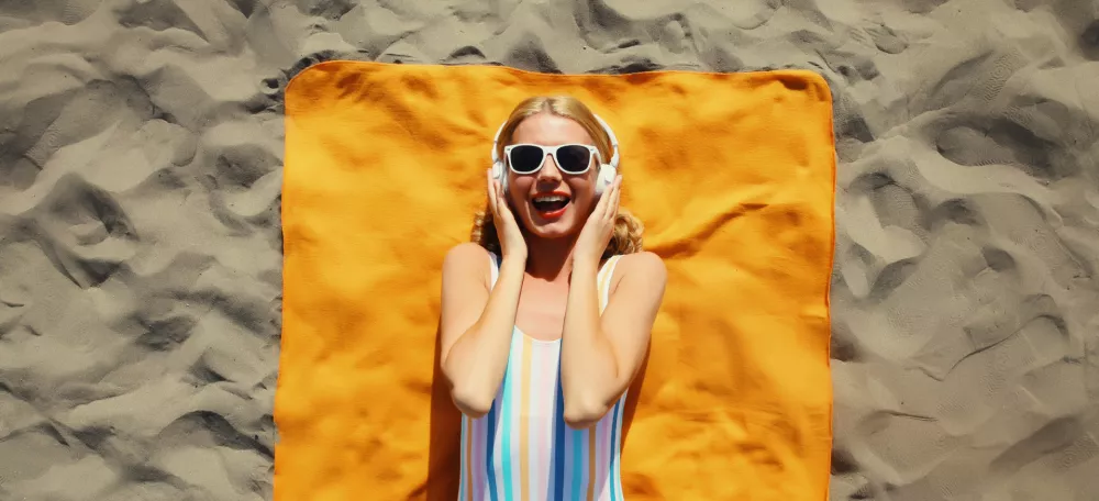 Ko imamo slu&scaron;alke na glavi, je to signal, da želimo biti sami s sabo. / Foto: Istock