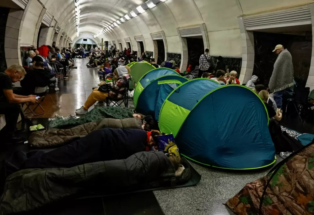 People take shelter inside a metro station during a Russian drone and missile strike, amid Russia's attack on Ukraine, in Kyiv, Ukraine July 3, 2025. REUTERS/Yan Dobronosov