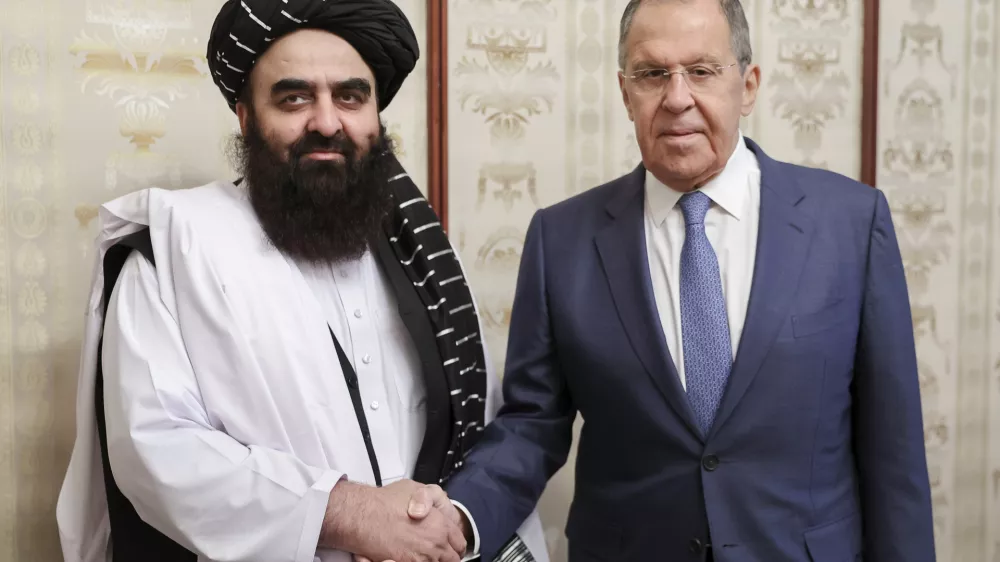 FILE - In this photo released by Russian Foreign Ministry Press Service on Oct. 4, 2024, Russian Foreign Minister Sergey Lavrov, right, and Acting Foreign Minister of Afghanistan's Taliban movement Amir Khan Muttaqi pose for a photo prior to their talks in Moscow, Russia. (Russian Foreign Ministry Press Service via AP, File)