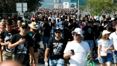 People arrive ahead of the concert of the Croatian singer Marko Perkovic Thompson, which is poised to break the world record for largest paid concert in Zagreb, Croatia, July 5, 2025. REUTERS/Borut Zivulovic