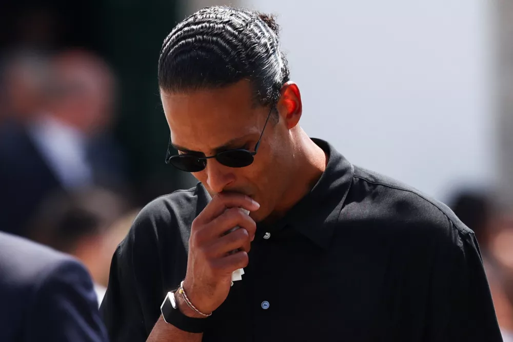 Liverpool's captain Virgil van Dijk reacts at the funeral ceremony of Liverpool's Portuguese soccer player Diogo Jota and his brother Andre Silva, who died in a car crash near Zamora, Spain, at the Chapel of the Resurrection, in Gondomar, Portugal, July 5, 2025. REUTERS/Pedro Nunes