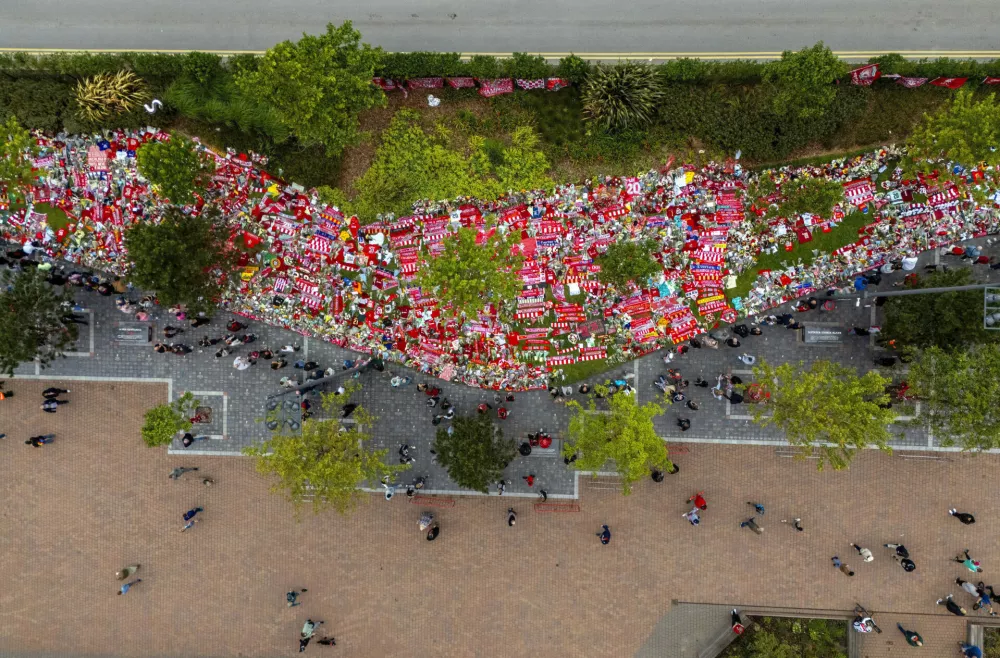 Tributes at Anfield Stadium, home of Liverpool, in memory of Diogo Jota who has died at the age of 28, Saturday, July 5, 2025. (Peter Byrne/PA via AP)