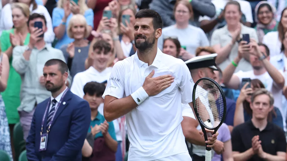 Tennis - Wimbledon - All England Lawn Tennis and Croquet Club, London, Britain - July 5, 2025 Serbia's Novak Djokovic celebrates after winning his third round match against Serbia's Miomir Kecmanovic REUTERS/Toby Melville