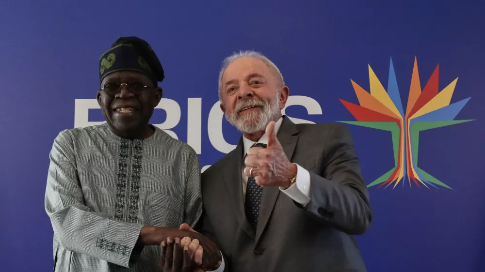 Brazilian President Luiz Inacio Lula da Silva, right, flashes a thumbs up while receiving Nigerian President Bola Tinubu for their bilateral meeting ahead of the upcoming 17th annual BRICS summit, in Rio de Janeiro, Saturday, July 5, 2025. (AP Photo/Bruna Prado)
