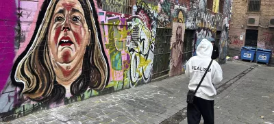 A likeness of Erin Patterson is painted on a wall in Melbourne, Australia, on June 28, 2025. (AP Photo/Rod McGuirk)