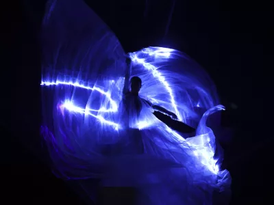 A model wears a creation as part of the Iris van Herpen Fall-Winter 2025/26 Haute Couture collection presented Monday, July 7, 2025, in Paris. (AP Photo/Tom Nicholson)