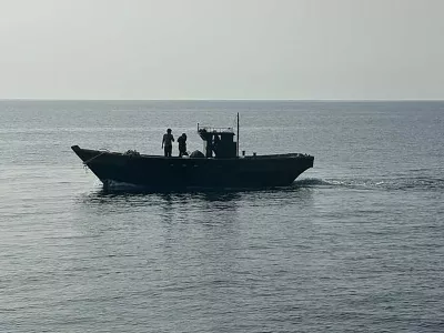 Fotografija je bila narejena 9. julija in kaže prečkanje morske meje ribičev, ki so se želeli vrniti domov. / Foto: Profimedia