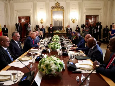 FILE PHOTO: Senegal's President Bassirou Diomaye Faye, Guinea-Bissau's President Umaro Sissoco, Mauritania's President Mohamed Ould Ghazouani, Liberian President Joseph Boakai and Gabon's President Brice Oligui Nguema attend a lunch for African representatives of Gabon, Guinea-Bissau, Liberia, Mauritania, and Senegal hosted by U.S. President Donald Trump in the State Dining Room at the White House in Washington, D.C., U.S., July 9, 2025. REUTERS/Kevin Lamarque/File Photo